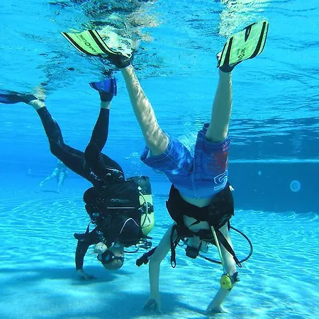 לינה וארוחת בוקר Puravida Divehouse *